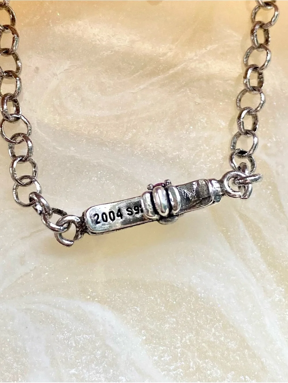 Sterling Silver Cross Bracelet with Pink Stones